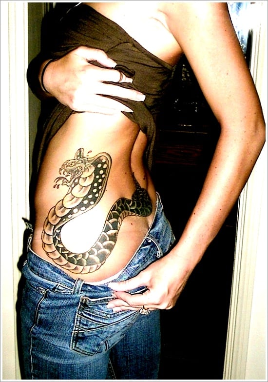 Snake tattoo on the right side of the hip