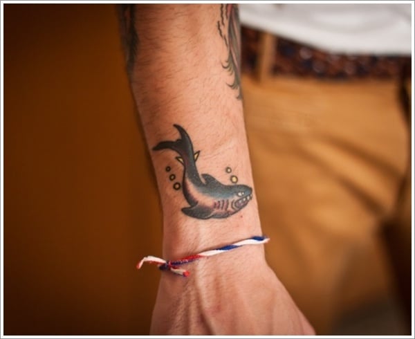 Little Tattoos  Minimalist shark tattoo on the pelvis Tattoo