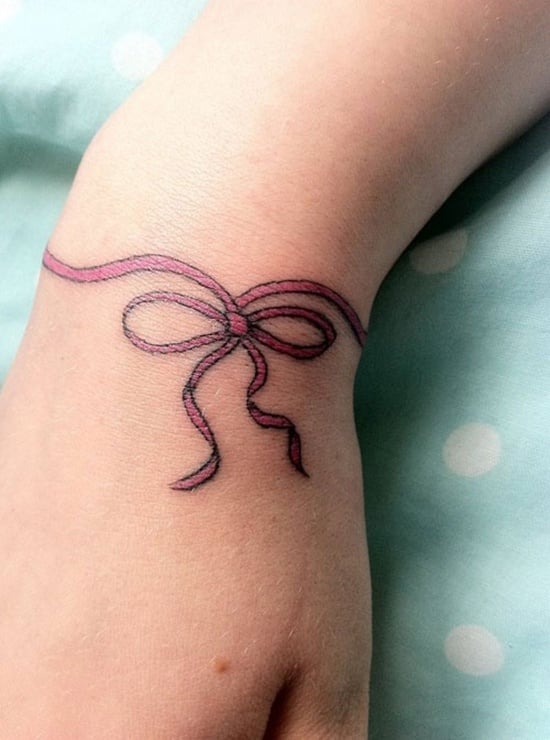 Pin by Jennifer SteenSchroeder on Tattoo ideas  Neck tattoo Lace bow  tattoos Bow tattoo