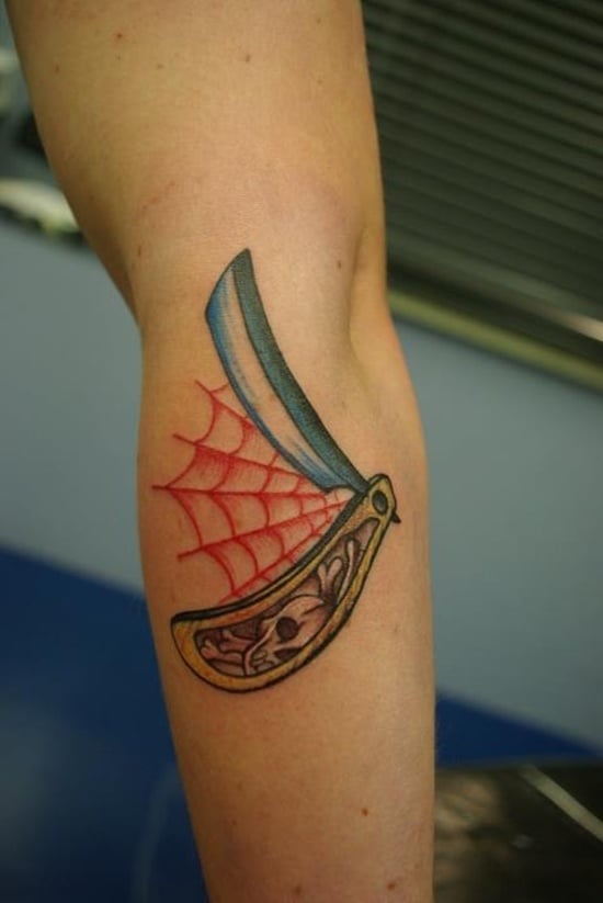 razor blade cutting skin tattoo