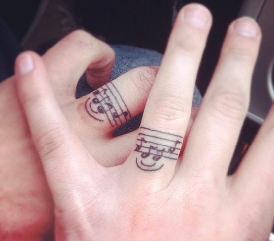 36 Wedding Band Tattoos: Simple But Lovely Designs | Spiritustattoo.com | Wedding  band tattoo, Tattoo wedding rings, Wedding ring finger tattoos