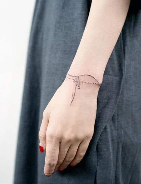 Pin by simona on Tattoo | Wrist bracelet tattoo, Anklet tattoos, Bracelet  tattoos with names